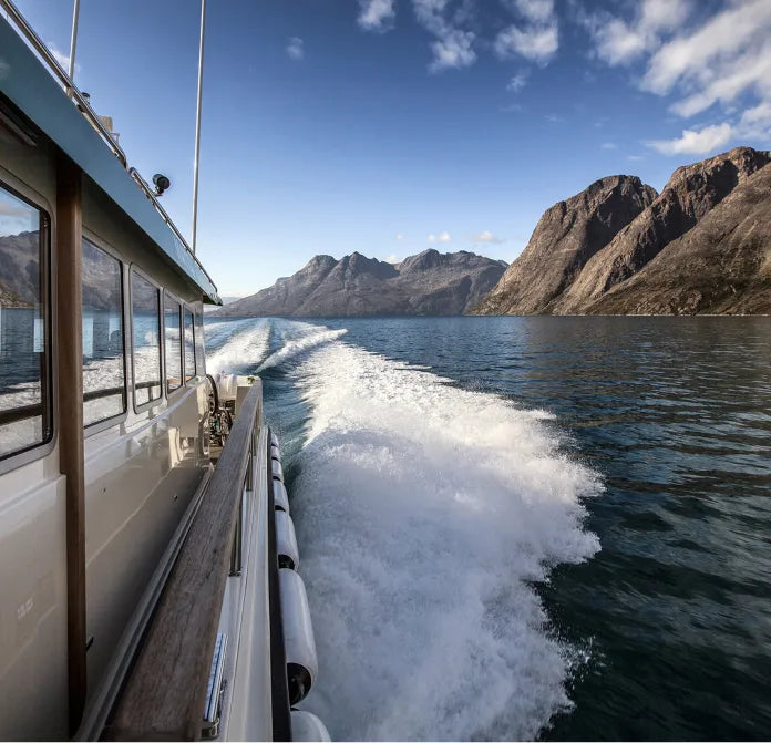 Targa boat cruising over the water